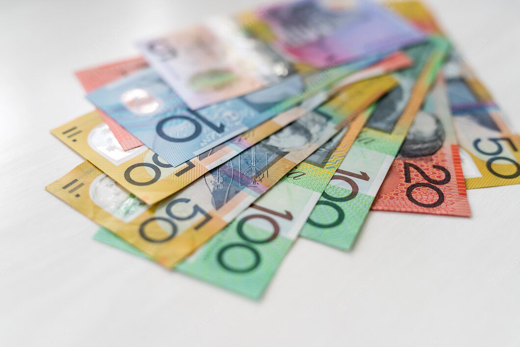 colorful-australian-dollars-laying-wooden-table